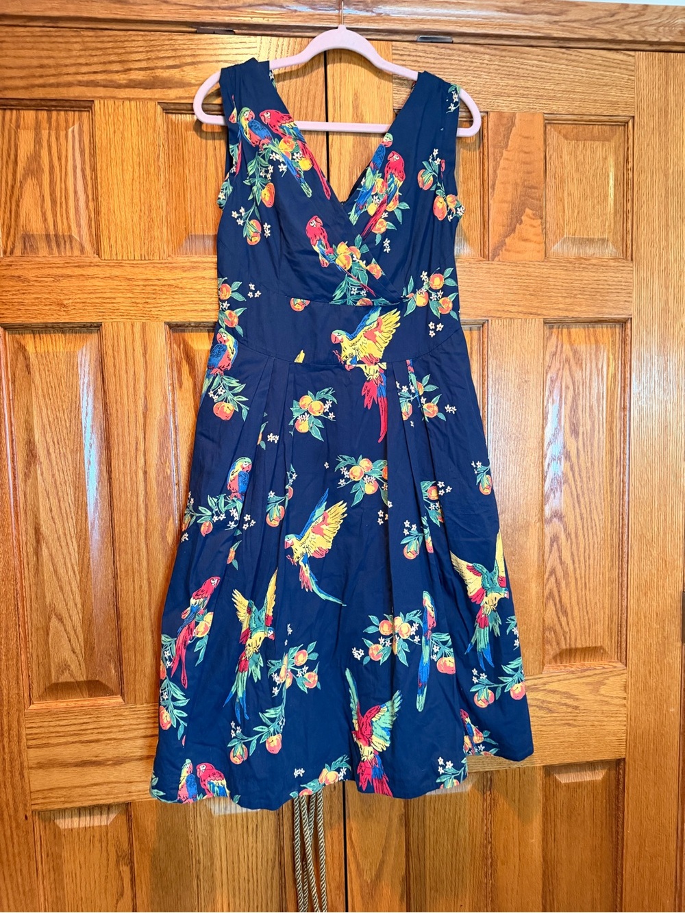 Emily and Fin Sleeveless Navy Midi Dress with Colorful Parrot Floral Print